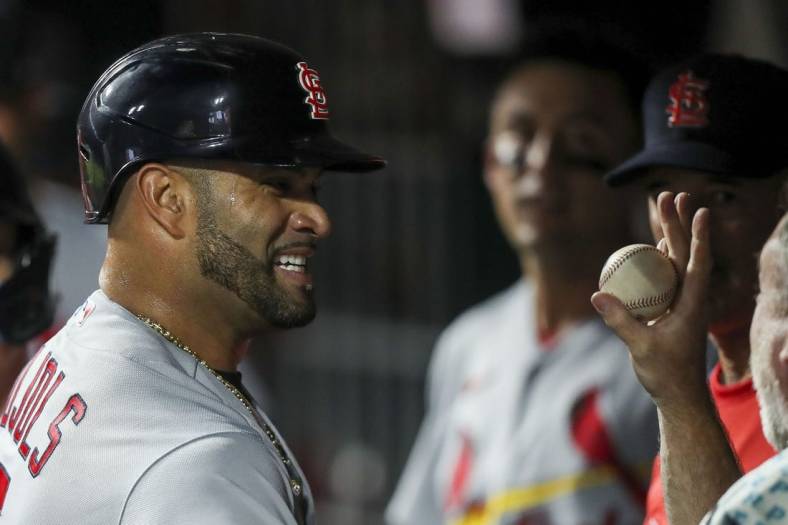 Aug 29, 2022; Cincinnati, Ohio, USA; St. Louis Cardinals first baseman Albert Pujols (5) reacts after hitting a two-run home run against the Cincinnati Reds in the third inning at Great American Ball Park. Mandatory Credit: Katie Stratman-USA TODAY Sports