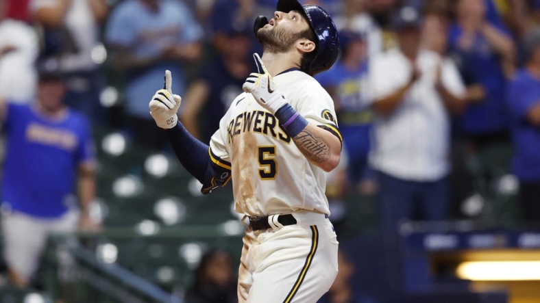 Aug 29, 2022; Milwaukee, Wisconsin, USA;  Milwaukee Brewers center fielder Garrett Mitchell (5) celebrates after hitting a two run home run during the eighth inning against the Pittsburgh Pirates at American Family Field. Mandatory Credit: Jeff Hanisch-USA TODAY Sports