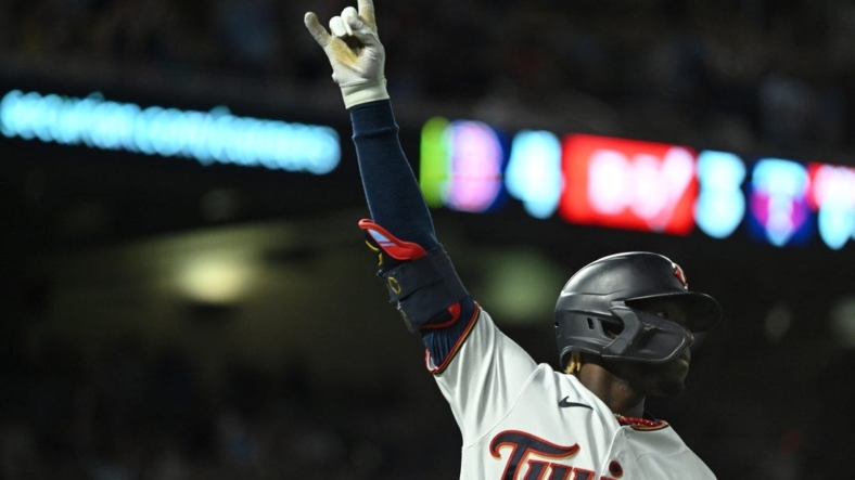 Aug 30, 2022; Minneapolis, Minnesota, USA;  Minnesota Twins outfielder Nick Gordon (1) celebrates his grand slam against the Boston Red Sox as he rounds the bases during the fifth inning at Target Field. Mandatory Credit: Nick Wosika-USA TODAY Sports