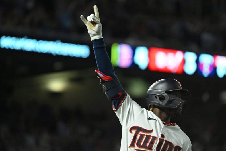 Aug 30, 2022; Minneapolis, Minnesota, USA;  Minnesota Twins outfielder Nick Gordon (1) celebrates his grand slam against the Boston Red Sox as he rounds the bases during the fifth inning at Target Field. Mandatory Credit: Nick Wosika-USA TODAY Sports