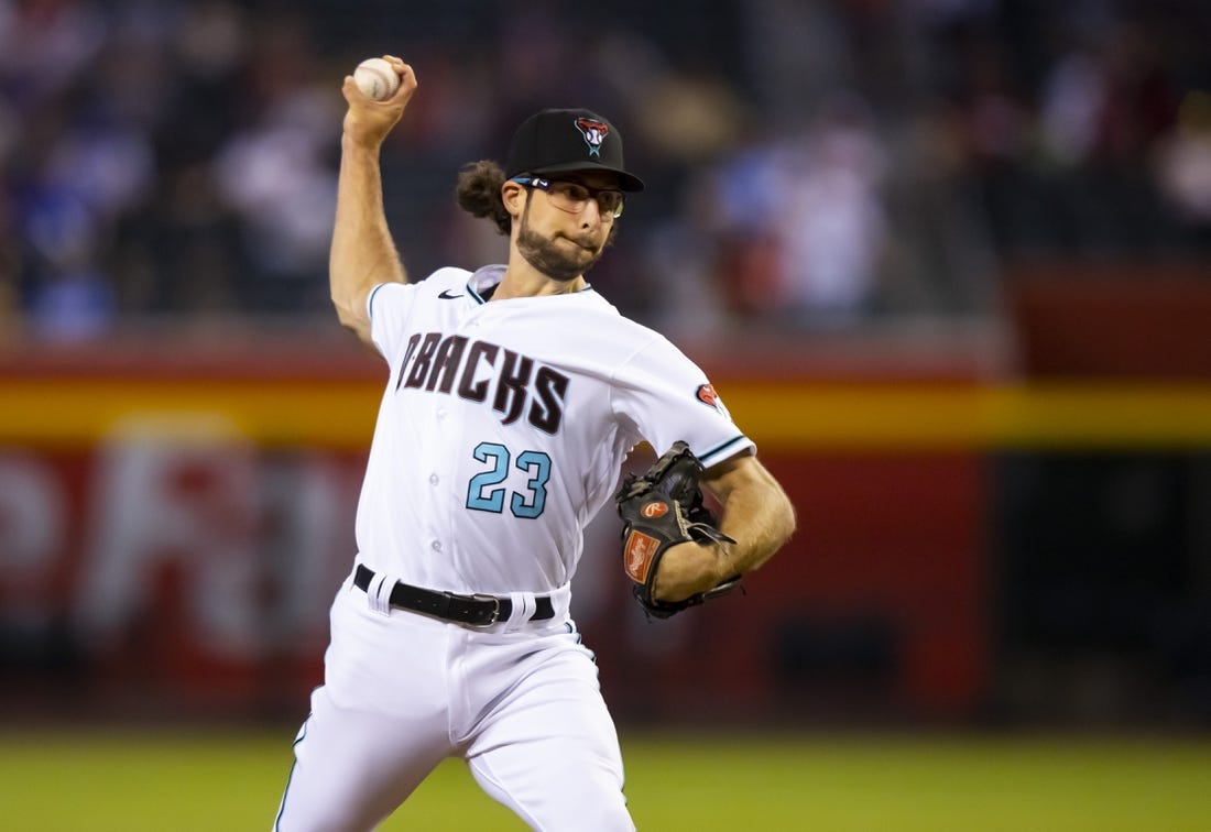 Aug 30, 2022; Phoenix, Arizona, USA; Arizona Diamondbacks pitcher Zac Gallen throws in the first inning against the Philadelphia Phillies at Chase Field. Mandatory Credit: Mark J. Rebilas-USA TODAY Sports