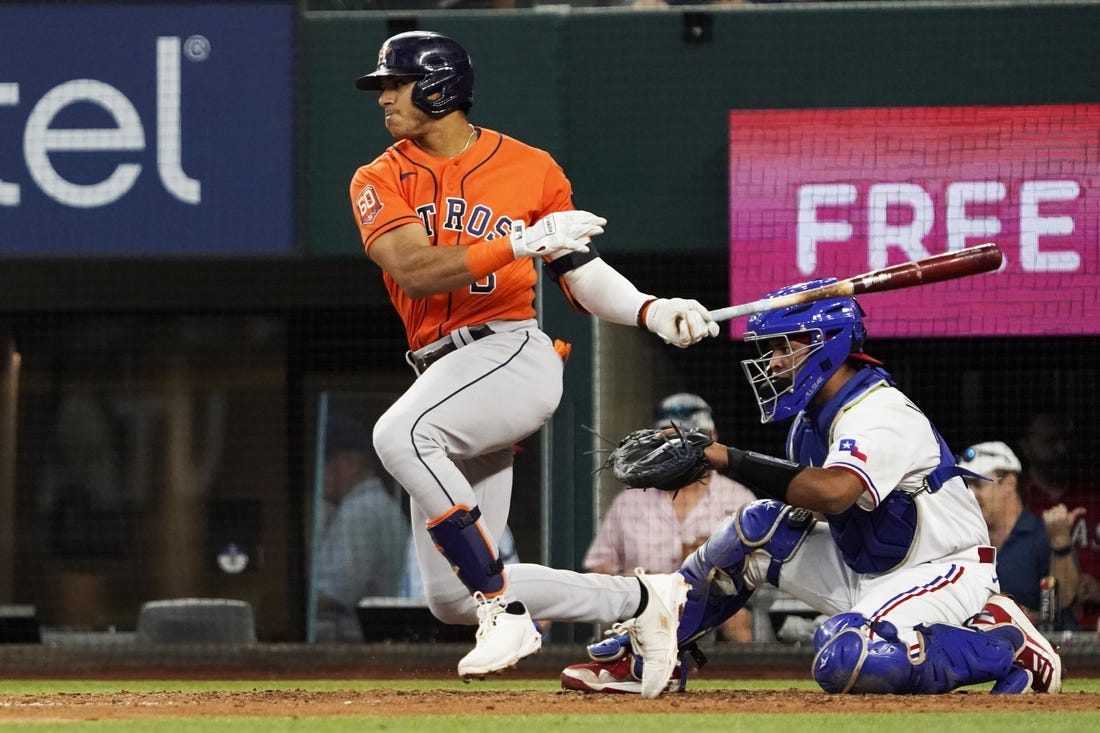 Aug 31, 2022; Arlington, Texas, USA; Houston Astros shortstop Jeremy Pena (3) follows thru on a single during the fourth inning against the Texas Rangers at Globe Life Field. Mandatory Credit: Raymond Carlin III-USA TODAY Sports