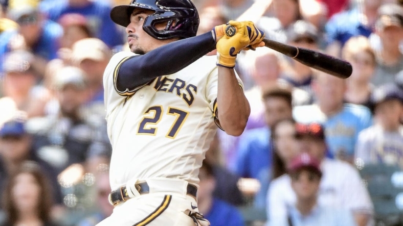 Aug 31, 2022; Milwaukee, Wisconsin, USA;  Milwaukee Brewers shortstop Willy Adames (27) hits an RBI double in the fifth inning against the Pittsburgh Pirates at American Family Field. Mandatory Credit: Benny Sieu-USA TODAY Sports