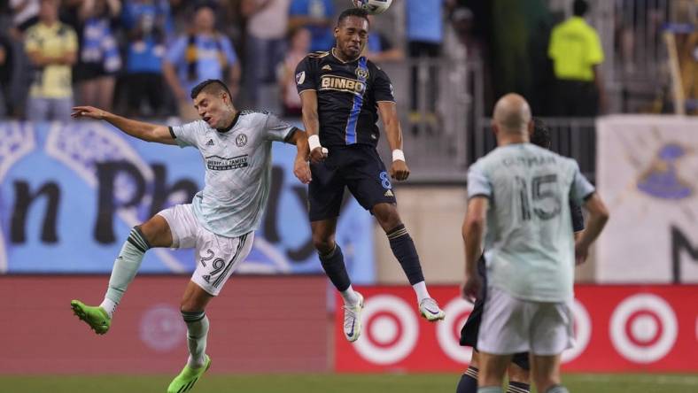 Aug 31, 2022; Chester, Pennsylvania, USA; Philadelphia Union midfielder Jose Andres Martinez (8) heads the ball against Atlanta United forward Ronaldo Cisneros (29) in the first half at Subaru Park. Mandatory Credit: Mitchell Leff-USA TODAY Sports