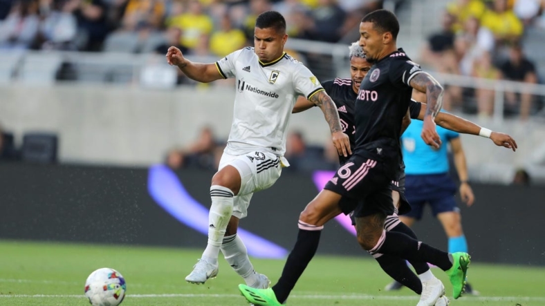 Aug 31, 2022; Columbus, Ohio, USA;  Columbus Crew forward Cucho Hernandez (9) fights for the ball with Inter Miami midfielder Mo Adams (6) during the first half at Lower.com Field. Mandatory Credit: Joseph Maiorana-USA TODAY Sports