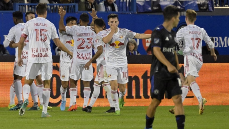 Aug 31, 2022; Montreal, Quebec, CAN; New York Red Bulls midfielder Lewis Morgan (10) celebrates after scoring a goal against the CF Montreal during the first half at Stade Saputo. Mandatory Credit: Eric Bolte-USA TODAY Sports
