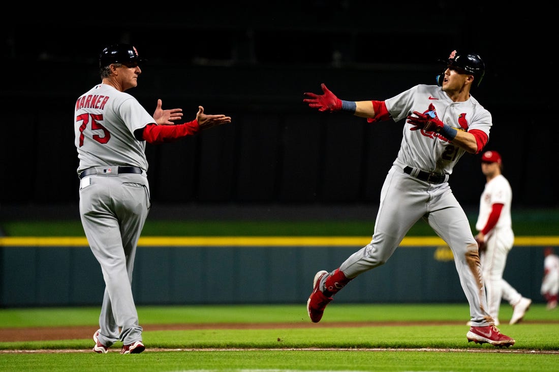 Cardinals score three in 13th inning, defeat Reds