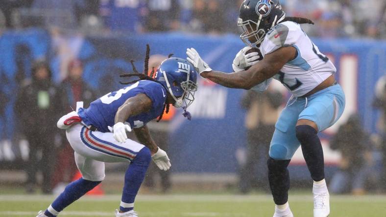 Tennessee Titans running back Derrick Henry (file photo) runs the ball against the New York Giants.