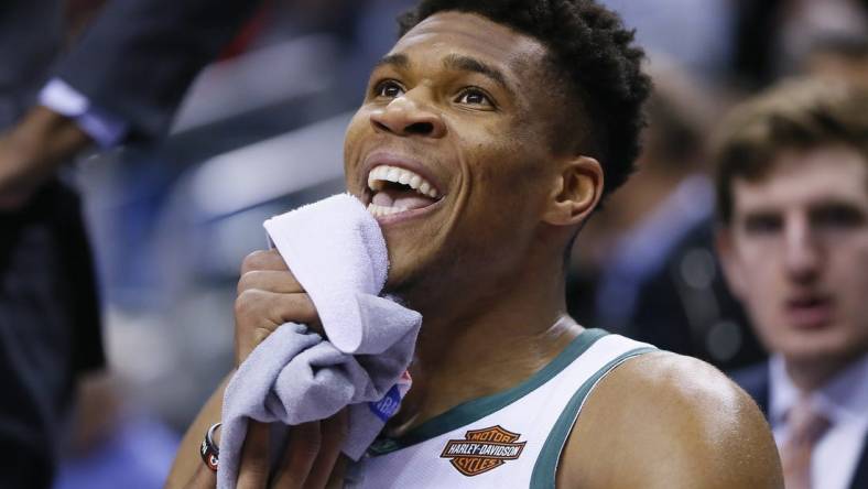 Jan 31, 2019; Toronto, Ontario, CAN; Milwaukee Bucks forward Giannis Antetokounmpo (34) smiles on the bench during a break against the Toronto Raptors at Scotiabank Arena. Milwaukee Bucks defeated Toronto. Mandatory Credit: John E. Sokolowski-USA TODAY Sports