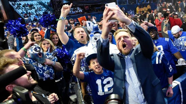 Former Colts punter Pat McAfee takes a selfie with fans after making the team's pick during the second day of the NFL Draft Friday, April 26, 2019, in Nashville, Tenn.

Gw42699