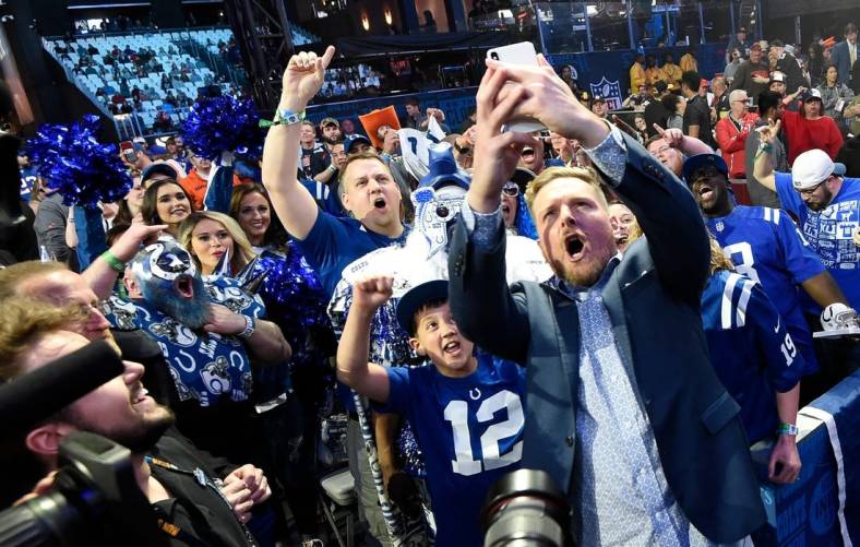 Former Colts punter Pat McAfee takes a selfie with fans after making the team's pick during the second day of the NFL Draft Friday, April 26, 2019, in Nashville, Tenn.

Gw42699