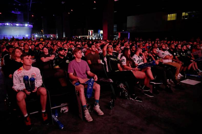 Jul 20, 2019; Miami Beach, FL, USA; Fans in attendance watch the game play between Faze Clan and 100 Thieves during the Call of Duty League Finals e-sports event at Miami Beach Convention Center. Mandatory Credit: Jasen Vinlove-USA TODAY Sports