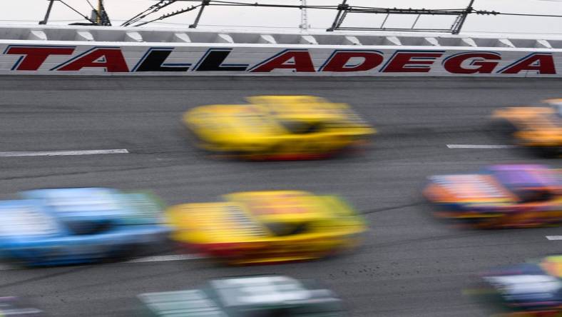 Oct 13, 2019; Talladega, AL, USA; View of the safety wall as drivers race around turn four during the 1000Bulbs.com 500 at Talladega Superspeedway. Mandatory Credit: Shanna Lockwood-USA TODAY Sports