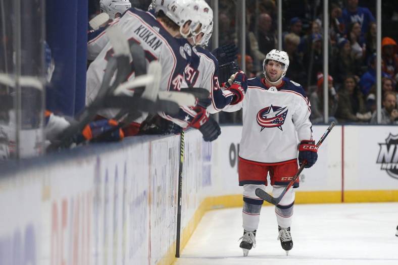 Dec 23, 2019; Uniondale, New York, USA; Columbus Blue Jackets left wing Nathan Gerbe (24) celebrates his goal against the New York Islanders with teammates during the second period at Nassau Veterans Memorial Coliseum. Mandatory Credit: Brad Penner-USA TODAY Sports