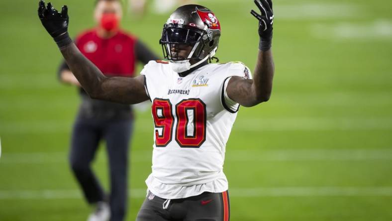 Feb 4, 2021; Tampa, FL, USA;  Tampa Bay Buccaneers linebacker Jason Pierre-Paul (90) reacts against the Kansas City Chiefs in Super Bowl LV at Raymond James Stadium.  Mandatory Credit: Mark J. Rebilas-USA TODAY Sports