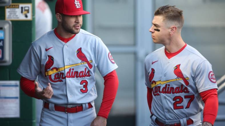 Apr 30, 2021; Pittsburgh, Pennsylvania, USA;  St. Louis Cardinals right fielder Dylan Carlson (3) and left fielder Tyler O'Neill (27) talk in the dugout  before playing the Pittsburgh Pirates at PNC Park. Mandatory Credit: Charles LeClaire-USA TODAY Sports