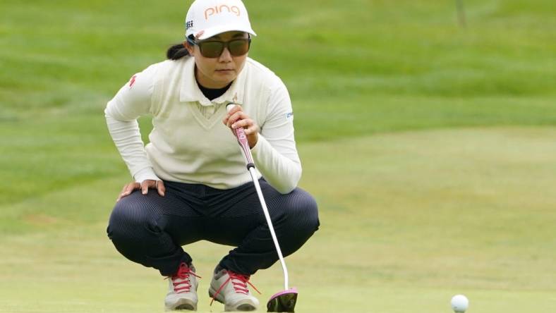 June 13, 2021; Daly City, California, USA; Ayako Uehara lines up her putt on the second hole during the final round of the LPGA MEDIHEAL Championship golf tournament at Lake Merced Golf Club. Mandatory Credit: Kyle Terada-USA TODAY Sports