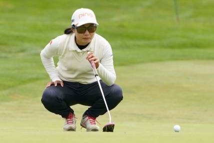 June 13, 2021; Daly City, California, USA; Ayako Uehara lines up her putt on the second hole during the final round of the LPGA MEDIHEAL Championship golf tournament at Lake Merced Golf Club. Mandatory Credit: Kyle Terada-USA TODAY Sports