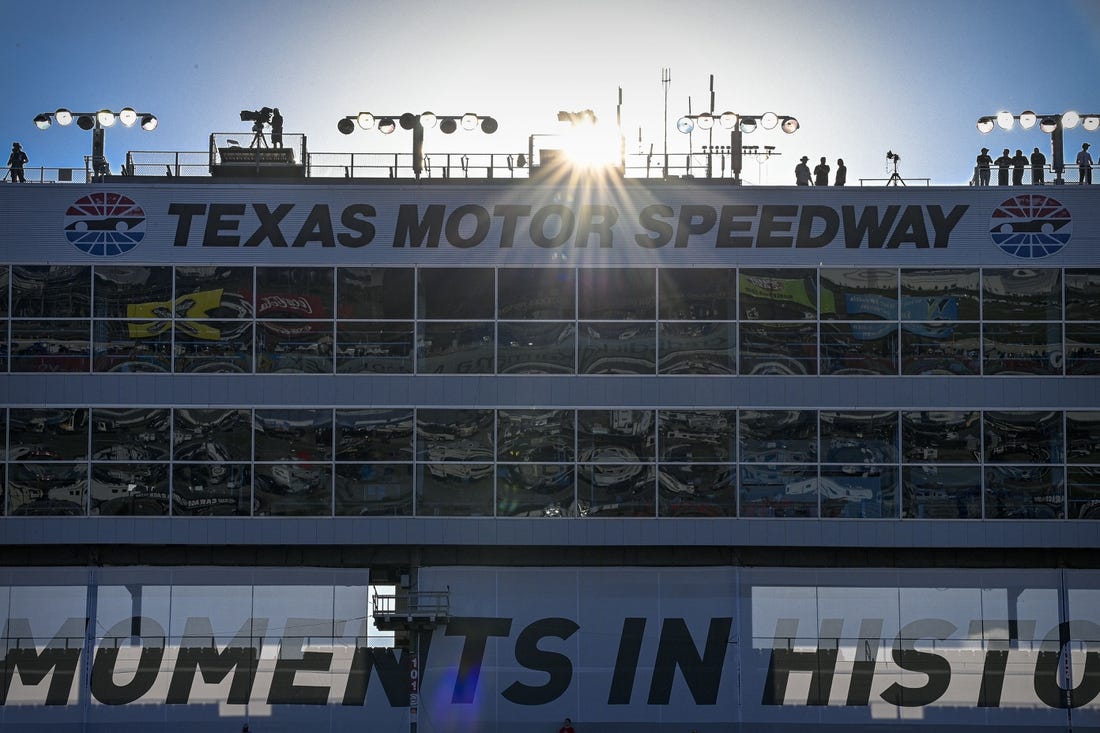 Jun 13, 2021; Fort Worth, TX, USA; A general view of the sunset and the track grandstands before the start of the NASCAR All-Star Race at Texas Motor Speedway. Mandatory Credit: Jerome Miron-USA TODAY Sports