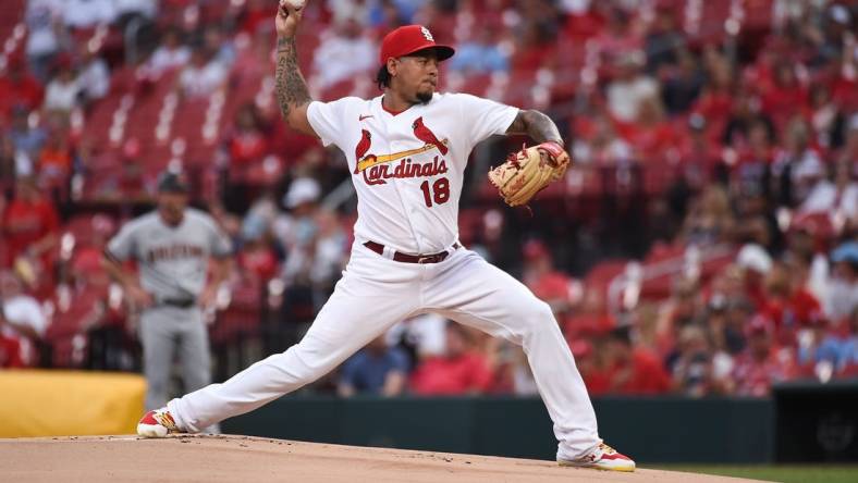 Jun 29, 2021; St. Louis, Missouri, USA; St. Louis Cardinals starting pitcher Carlos Martinez (18) pitches against the Arizona Diamondbacks during the first inning at Busch Stadium. Mandatory Credit: Joe Puetz-USA TODAY Sports