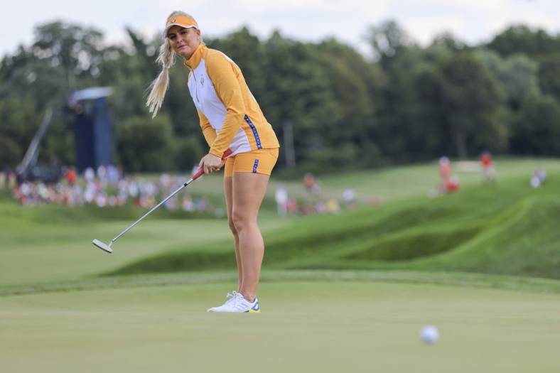 Sep 5, 2021; Toledo, Ohio, USA; Charley Hull of Team Europe putts on the ninth green during competition rounds of the Solheim Cup golf tournament at Inverness Club. Mandatory Credit: Aaron Doster-USA TODAY Sports