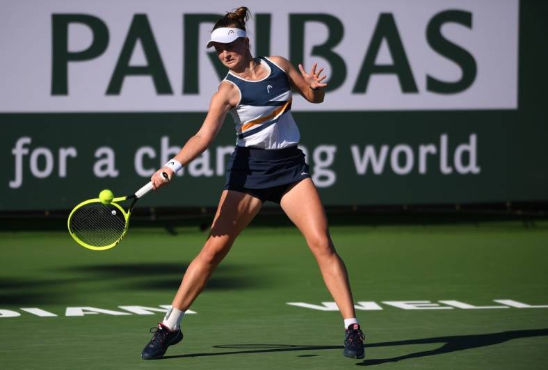 Oct 9, 2021; Indian Wells, CA, USA; Barbora Krejcikova (CZE) hits a shot against Zarina Diyas (KAZ) at Indian Wells Tennis Garden. Mandatory Credit: Orlando Ramirez-USA TODAY Sports