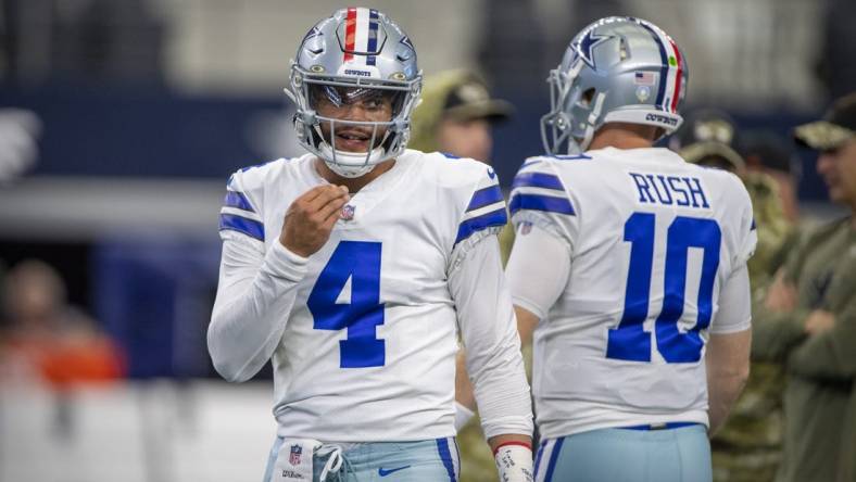 Dallas Cowboys quarterback Cooper Rush (10) and quarterback Dak Prescott (4) before the game between the Dallas Cowboys and the Denver Broncos at AT&T Stadium. Mandatory Credit: Jerome Miron-USA TODAY Sports