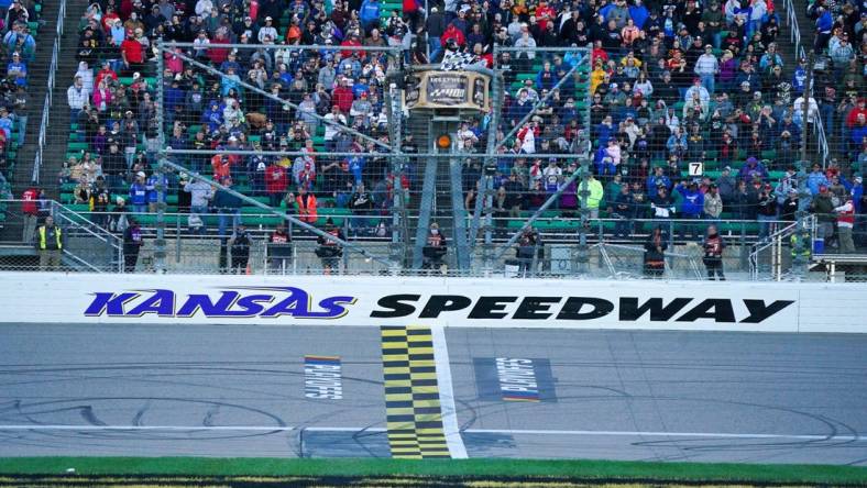 Oct 24, 2021; Kansas City, Kansas, USA; A general view of the finish line during the Hollywood Casino 400 at Kansas Speedway. Mandatory Credit: Denny Medley-USA TODAY Sports