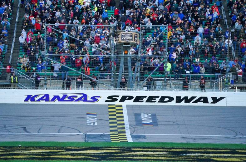 Oct 24, 2021; Kansas City, Kansas, USA; A general view of the finish line during the Hollywood Casino 400 at Kansas Speedway. Mandatory Credit: Denny Medley-USA TODAY Sports