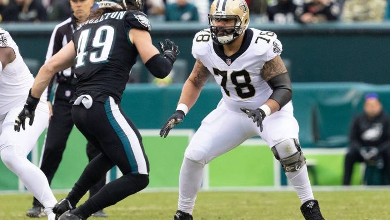 Nov 21, 2021; Philadelphia, Pennsylvania, USA; New Orleans Saints center Erik McCoy (78) in action against Philadelphia Eagles outside linebacker Alex Singleton (49) at Lincoln Financial Field. Mandatory Credit: Bill Streicher-USA TODAY Sports