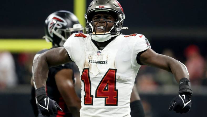 Dec 5, 2021; Atlanta, Georgia, USA; Tampa Bay Buccaneers wide receiver Chris Godwin (14) reacts after making a catch during the fist quarter against the Atlanta Falcons at Mercedes-Benz Stadium. Mandatory Credit: Jason Getz-USA TODAY Sports