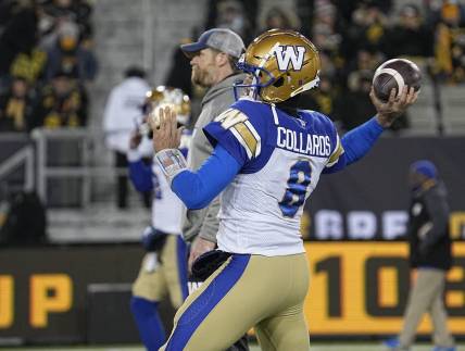 Dec 12, 2021; Hamilton, Ontario, CAN; Winnipeg Blue Bombers quarterback Zach Collaros (8) and head coach Mike O'Shea during warmup for the 108th Grey Cup football game against the Hamilton Tiger-Cats at Tim Hortons Field. Mandatory Credit: John E. Sokolowski-USA TODAY Sports