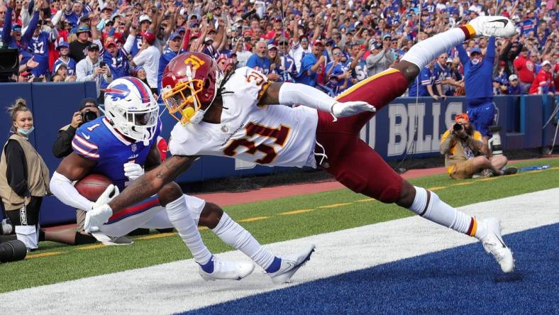 Bills receiver Emmanuel Sanders holds on to this pass behind Washington's  Kamren Curl for a 5 yard touchdown.

Jamie Germano Poy 3