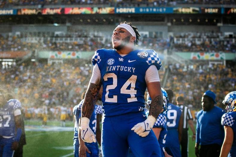 Kentucky running back Chris Rodriguez, Jr. (24) pumps up the crowd after scoring a touchdown a NCAA college football game in the Vrbo Citrus Bowl against Iowa, Saturday, Jan. 1, 2022, at Camping World Stadium in Orlando, Fla.

211231 Iowa Kentucky Citrus Fb 008 Jpg

Syndication Hawkcentral