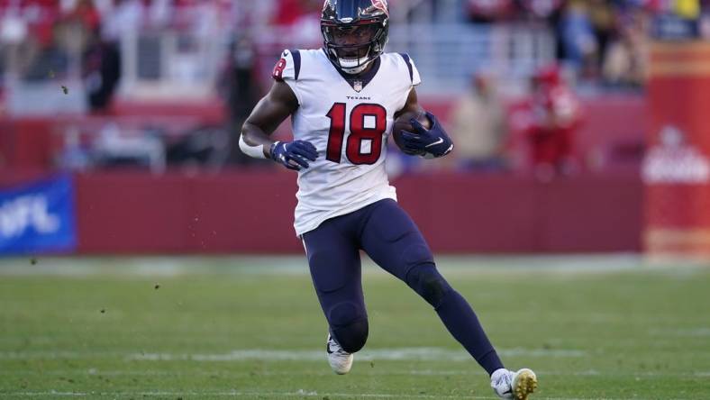 Jan 2, 2022; Santa Clara, California, USA; Houston Texans wide receiver Chris Conley (18) runs the ball against the San Francisco 49ers in the fourth quarter at Levi's Stadium. Mandatory Credit: Cary Edmondson-USA TODAY Sports