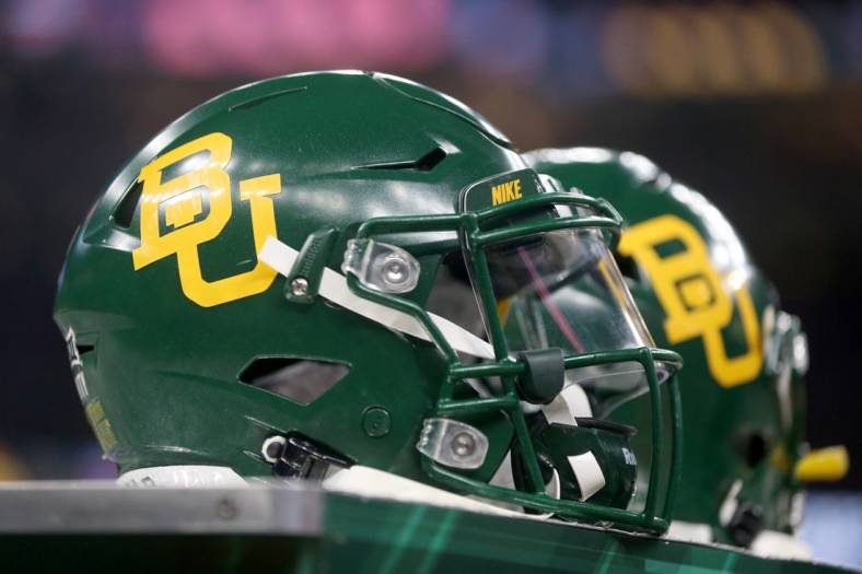 Jan 1, 2022; New Orleans, LA, USA; Baylor Bears helmets on the sidelines in the first quarter of the 2022 Sugar Bowl at the Caesars Superdome. Mandatory Credit: Chuck Cook-USA TODAY Sports