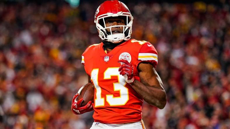 Jan 16, 2022; Kansas City, Missouri, USA; Kansas City Chiefs wide receiver Byron Pringle (13) reacts after scoring a touchdown against the Pittsburgh Steelers during the second half in an AFC Wild Card playoff football game at GEHA Field at Arrowhead Stadium. Mandatory Credit: Jay Biggerstaff-USA TODAY Sports