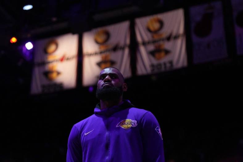 Los Angeles Lakers forward Lebron James (6) stands on the court during the national anthem prior to the game against the Miami Heat at FTX Arena. Mandatory Credit: Jasen Vinlove-USA TODAY Sports