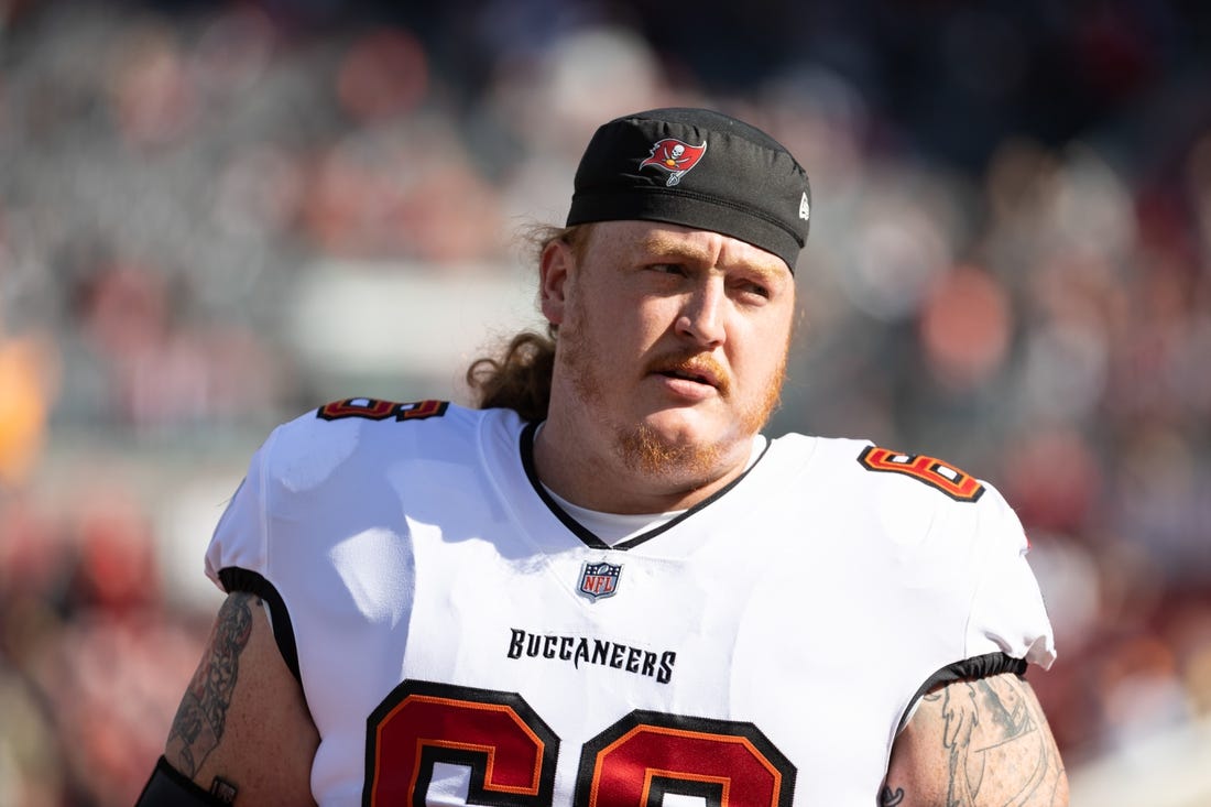 Jan 23, 2022; Tampa, Florida, USA; Tampa Bay Buccaneers center Ryan Jensen (66) warms up before the game against the Los Angeles Rams during a NFC Divisional playoff football game at Raymond James Stadium. Mandatory Credit: Matt Pendleton-USA TODAY Sports