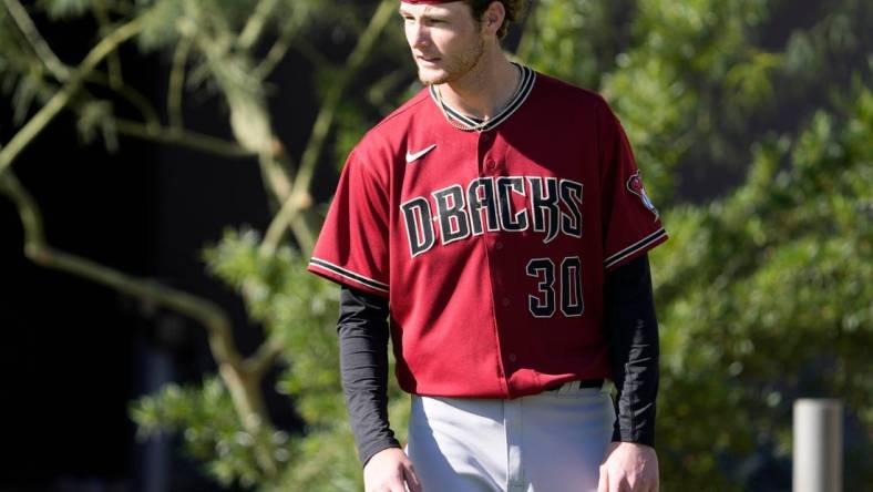 Feb 21, 2022; Scottsdale, Ariz., U.S.;  Diamondbacks minor league pitcher Ryne Nelson prepares during a select training camp for minor-league players not covered by the Players Association at Salt River Fields. MLB continues to be in a lockout after the expiration of the collective bargaining agreement Dec. 2. Mandatory Credit: Michael Chow-Arizona Republic

Baseball Diamondbacks Select Minor League Camp