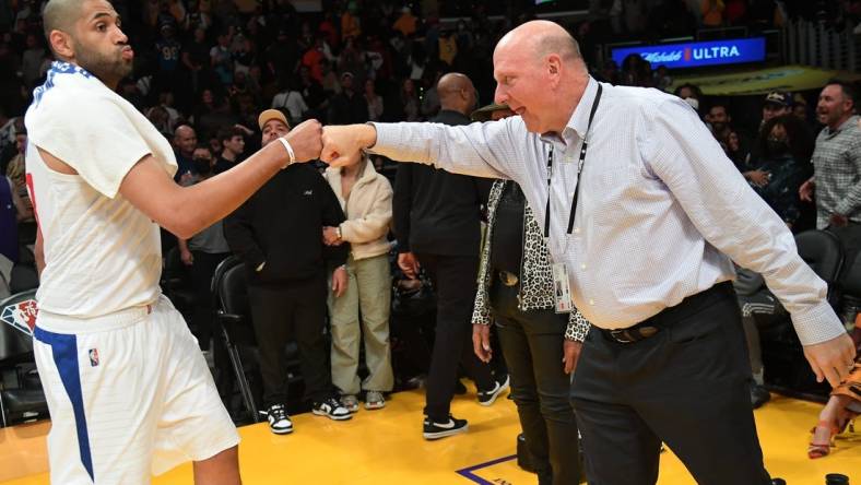 Feb 25, 2022; Los Angeles, California, USA;  Los Angeles Clippers owner Steve Ballmer gives a fist pump to forward Nicolas Batum (33) after defeating the Los Angeles Lakers at Crypto.com Arena. Mandatory Credit: Jayne Kamin-Oncea-USA TODAY Sports