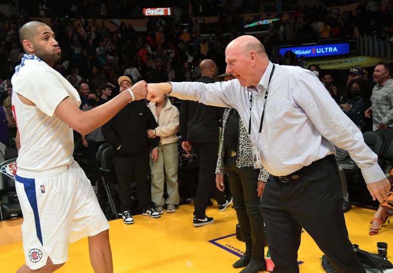 Feb 25, 2022; Los Angeles, California, USA;  Los Angeles Clippers owner Steve Ballmer gives a fist pump to forward Nicolas Batum (33) after defeating the Los Angeles Lakers at Crypto.com Arena. Mandatory Credit: Jayne Kamin-Oncea-USA TODAY Sports