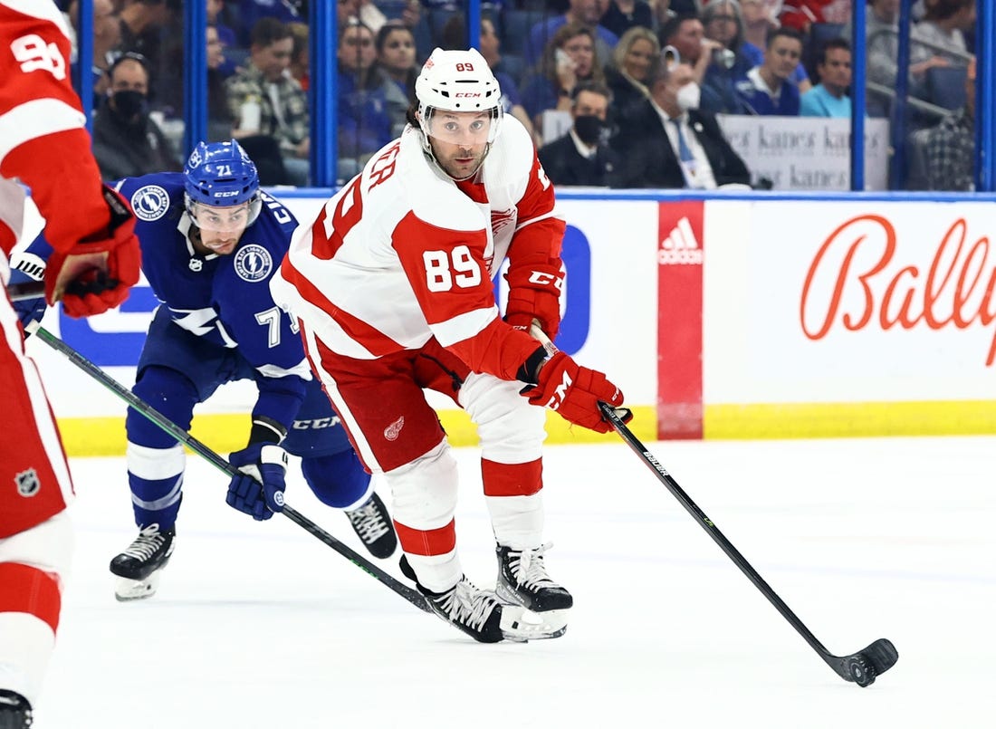 Mar 4, 2022; Tampa, Florida, USA; Detroit Red Wings center Sam Gagner (89) skates with the puck as Tampa Bay Lightning center Anthony Cirelli (71) defends during the second period at Amalie Arena. Mandatory Credit: Kim Klement-USA TODAY Sports