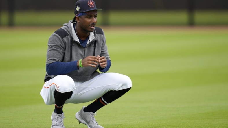 Mar 15, 2022; West Palm Beach, FL, USA; Houston Astros outfielder Lewis Brinson stretches during spring training work outs at The Ballpark of the Palm Beaches. Mandatory Credit: Jasen Vinlove-USA TODAY Sports