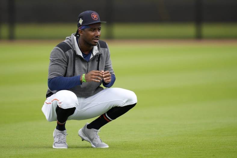 Mar 15, 2022; West Palm Beach, FL, USA; Houston Astros outfielder Lewis Brinson stretches during spring training work outs at The Ballpark of the Palm Beaches. Mandatory Credit: Jasen Vinlove-USA TODAY Sports