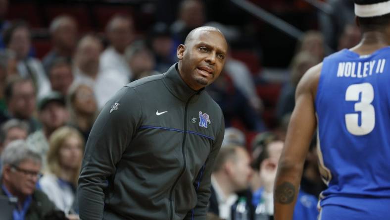 Mar 17, 2022; Portland, OR, USA; Memphis Tigers head coach Penny Hardaway talks with guard Landers Nolley II (3) in the first half against the Boise State Broncos during the first round of the 2022 NCAA Tournament at Moda Center. Mandatory Credit: Soobum Im-USA TODAY Sports