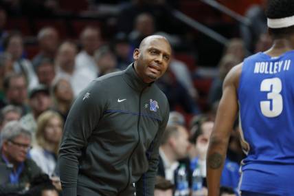 Mar 17, 2022; Portland, OR, USA; Memphis Tigers head coach Penny Hardaway talks with guard Landers Nolley II (3) in the first half against the Boise State Broncos during the first round of the 2022 NCAA Tournament at Moda Center. Mandatory Credit: Soobum Im-USA TODAY Sports
