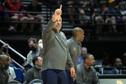 Mar 18, 2022; San Diego, CA, USA; Notre Dame Fighting Irish head coach Mike Brey signals in the first half against the Alabama Crimson Tide during the first round of the 2022 NCAA Tournament at Viejas Arena. Mandatory Credit: Orlando Ramirez-USA TODAY Sports