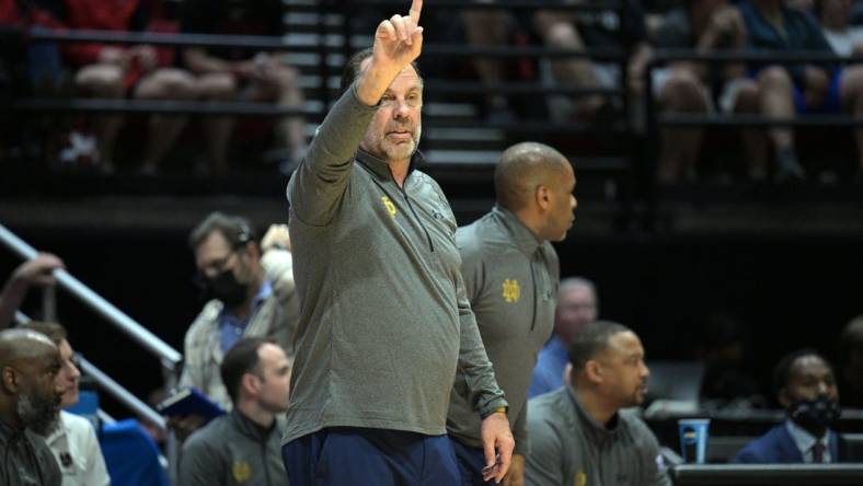 Mar 18, 2022; San Diego, CA, USA; Notre Dame Fighting Irish head coach Mike Brey signals in the first half against the Alabama Crimson Tide during the first round of the 2022 NCAA Tournament at Viejas Arena. Mandatory Credit: Orlando Ramirez-USA TODAY Sports