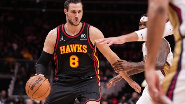 Mar 20, 2022; Atlanta, Georgia, USA; Atlanta Hawks forward Danilo Gallinari (8) controls the ball against the New Orleans Pelicans during the first half at State Farm Arena. Mandatory Credit: Dale Zanine-USA TODAY Sports